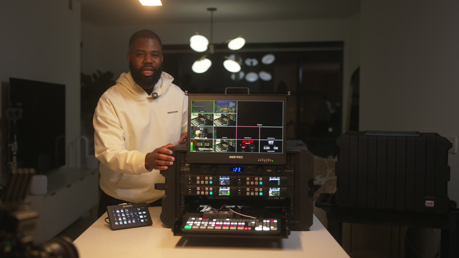 Winston McFarlane standing behind his multicam live-stream fly pack